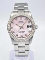 photo de Montre Rolex Datejust 31 mm pour femme, cadran en nacre rose, lunette en diamants