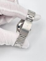 photo de Montre Rolex Datejust 31 mm pour femme, cadran en nacre rose, lunette en diamants