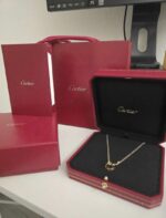 CARTIER PENDENTIF LOVE OR JAUNE 750/1000, 2 DIAMANTS